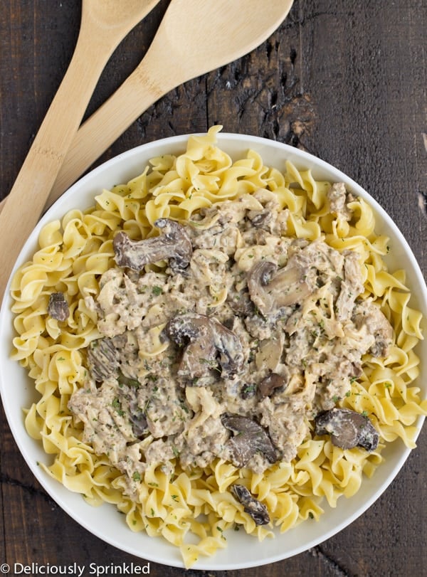 This Instant Pot Hamburger Stroganoff is quick, easy, and so delicious! Full of egg noodles, ground hamburger, mushrooms, and spices! Ready in 30 mins! deliciouslysprinkled.com #instantpot #dinner