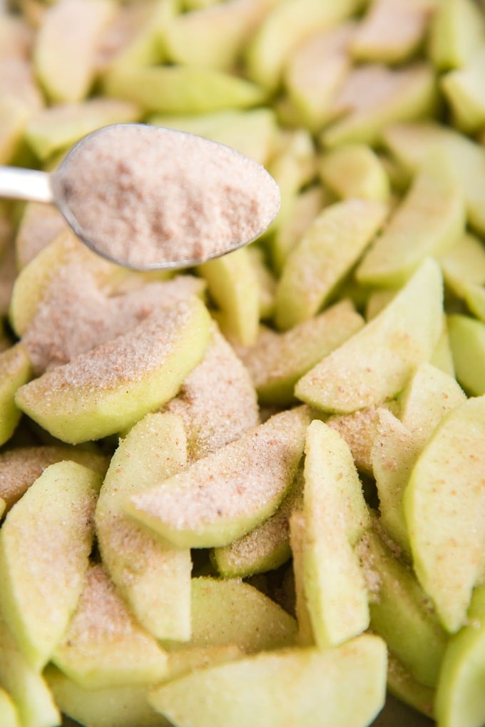 sprinkle apple filling over apples with spoon