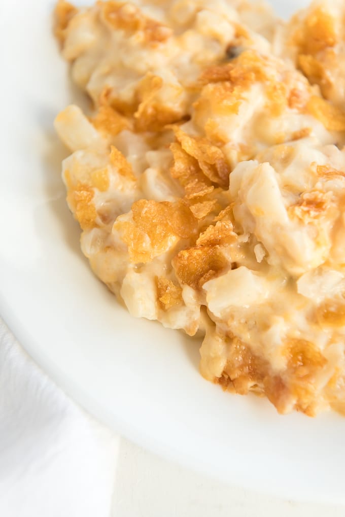 up close shot of cheesy hash brown casserole plated