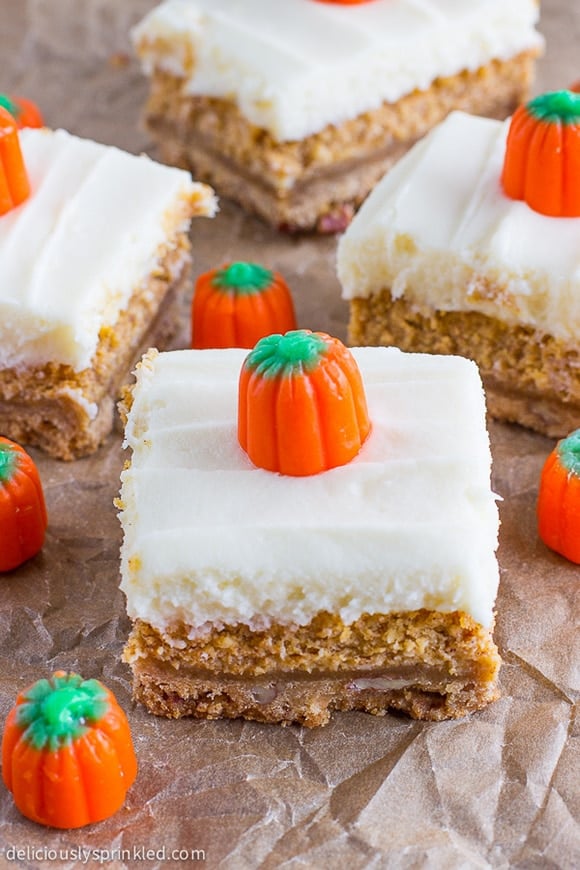 ready to serve pumpkin cheesecake bars on paper