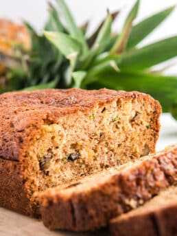 This delicious pineapple zucchini bread is the perfect combination of sweet and savory flavors. Made with fresh zucchini and juicy crushed pineapple, this bread is moist and flavorful with a hint of tropical flair. Whether you're looking for a tasty breakfast treat or a satisfying afternoon snack, this pineapple zucchini bread is sure to hit the spot!