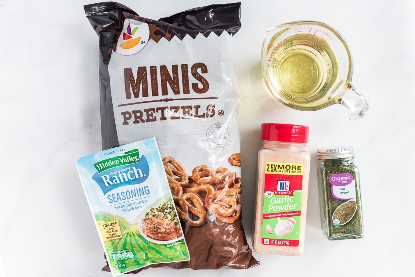 An overhead shot of ingredients needed to make ranch pretzels. 