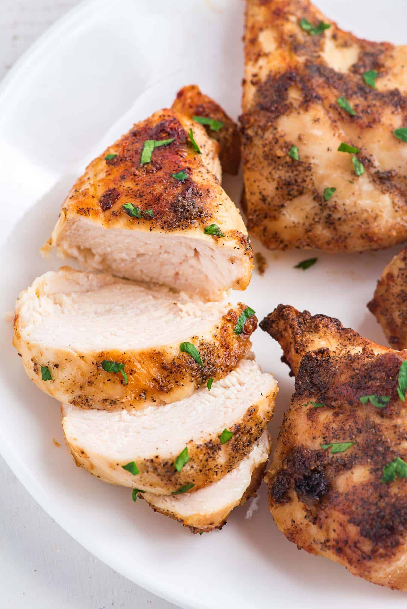 Cut chicken cooked in the air fryer, seasoned and delicious. 