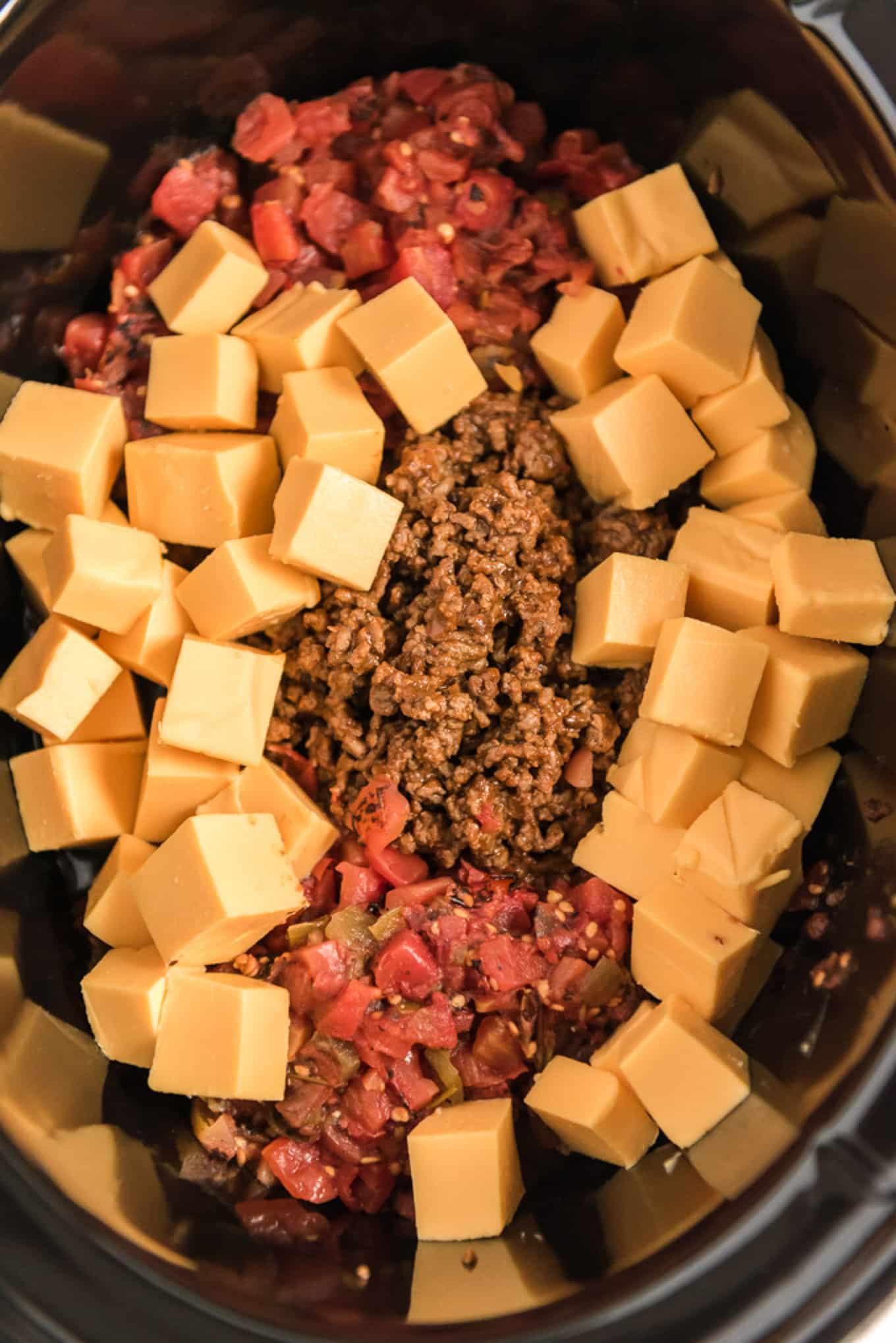 An overhead shot of a crockpot full of the slow cooker crockpot ingredients.