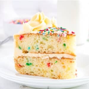 A slice of funfetti cake mix from a box on a plate.