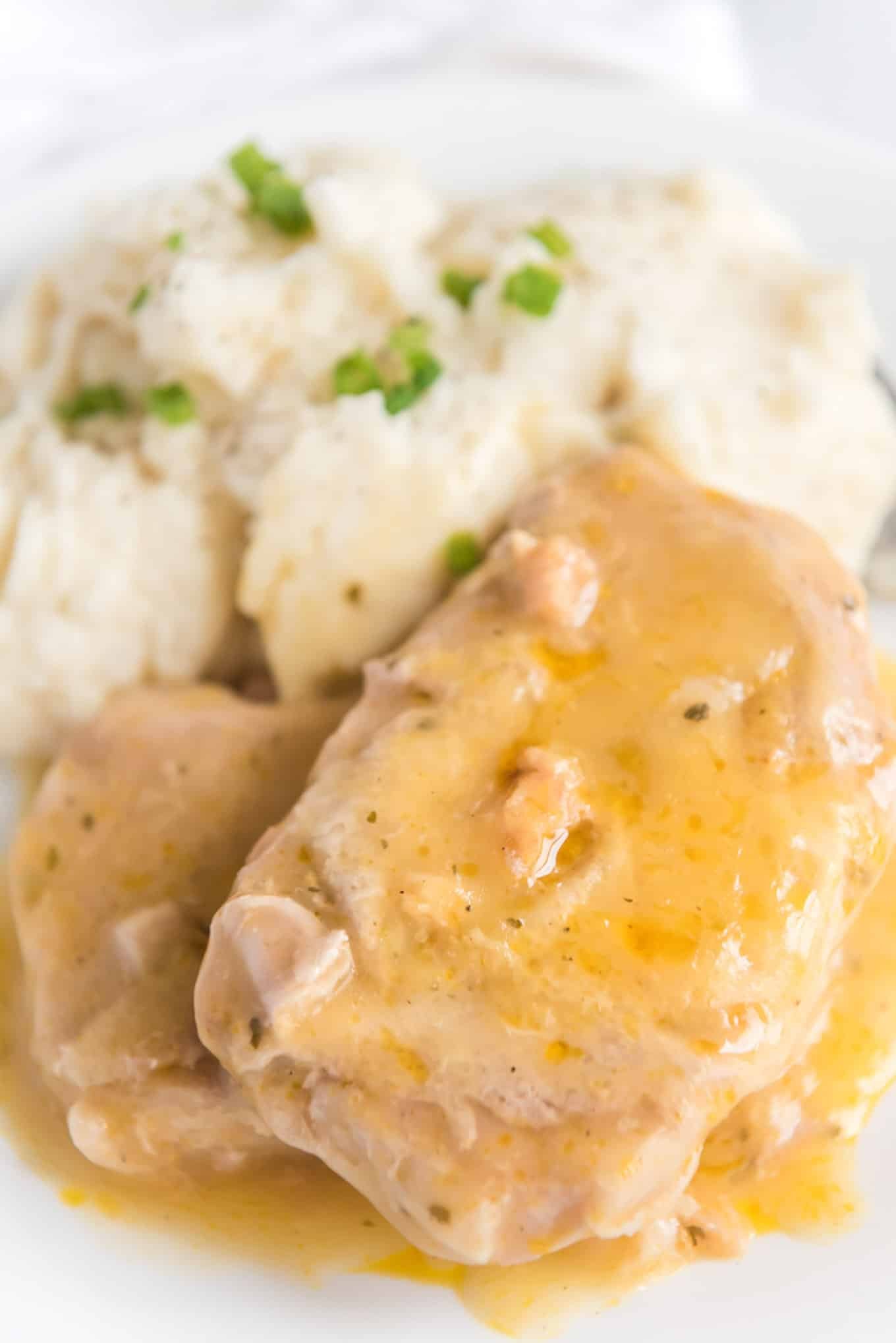 Pork chops made in a crockpot with mashed potatoes. 