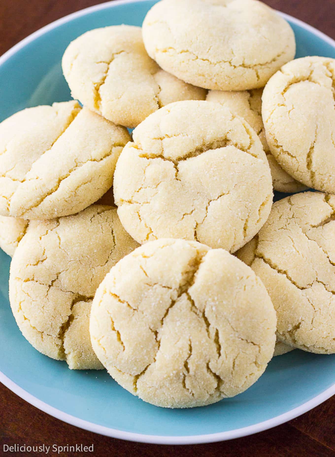 A pile of easy sugar cookies on a plate on the table.