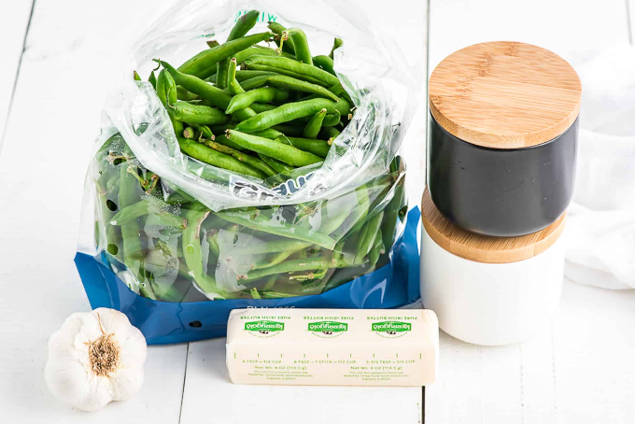 Ingredients needed to make when blanching green beans on the counter before cooking.