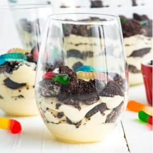 Individual cup with prepared Oreo dirt cake inside.